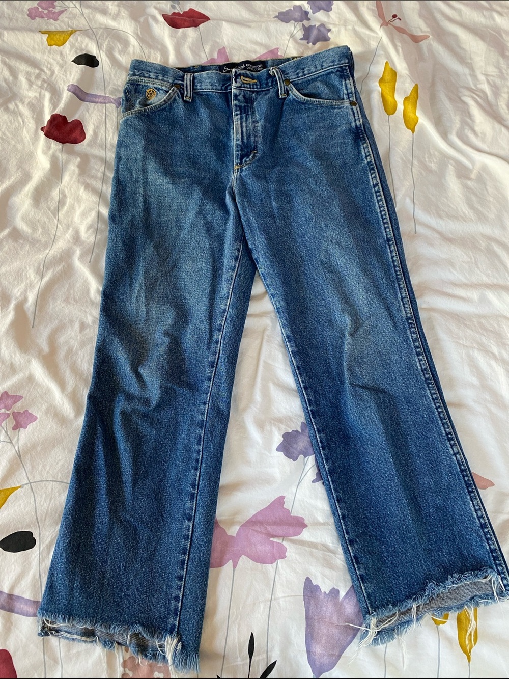Wrangler Blue Denim Cowboy Cut with Asymmetrical Cut-off Hem